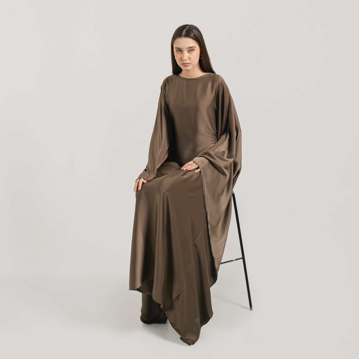 serene-luxury-eid-abaya-premium-silk-oat-brown-model-pose-sit